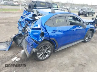 2023 Subaru WRX z VIN JF1VBAA65P9812785, wystawiony jako IAAI lot #41944628 z przebiegiem 15 080 mil mil oraz . Historia ofert i sprzedaży dostępna na DreamBid. Obrazek 4.
