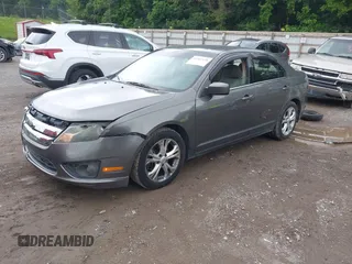 2012 Ford Fusion SE with VIN 3FAHP0HA1CR312687, listed as a IAAI auction lot 42342538 with 216,914 mi miles and . Bid and sale history available at DreamBid. Image 2.