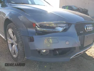 2014 Audi allroad Premium with VIN WA1TFAFL2EA068850, listed as a IAAI auction lot 41640053 with 168,660 mi miles. Bid and sale history available at carsss.com. Image 6.