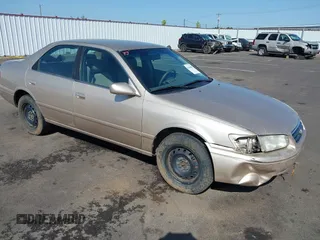 2000 Toyota Camry CE z VIN JT2BG22K2Y0440255, wystawiony jako IAAI lot #42088080 z przebiegiem 353 102 mil mil oraz . Historia ofert i sprzedaży dostępna na DreamBid. Obrazek 1.