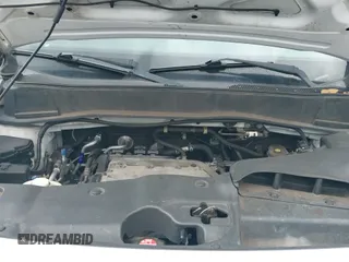 2013 Honda Pilot Touring with VIN 5FNYF4H95DB077773, listed as a IAAI auction lot 43046082 with 121,441 mi miles and . Bid and sale history available at DreamBid. Image 18.