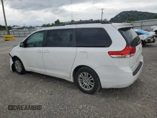 2012 Toyota Sienna XLE AAS with VIN 5TDYK3DC0CS212613, listed as a Copart auction lot 62317765 with 258,124 mi miles and Salvage title. Bid and sale history available at DreamBid. Image 2.