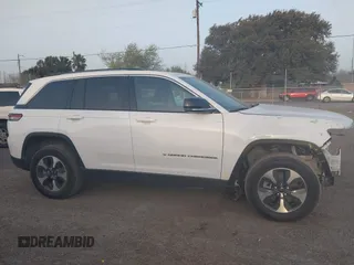 2022 Jeep Grand Cherokee with VIN 1C4RJYB63N8762798, listed as a IAAI auction lot 41723969 with 23,853 mi miles and . Bid and sale history available at DreamBid. Image 14.
