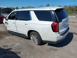 2022 GMC Yukon SLT with VIN 1GKS1BKT7NR329018, listed as a IAAI auction lot 41181065 with 50,551 mi miles. Bid and sale history available at carsss.com. Image 3.