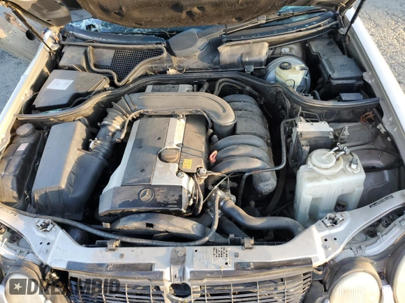 1997 Mercedes-Benz E-Class with VIN WDBJF55F8VA415967, listed as a Copart auction lot 74144924 with 0 mi miles and Salvage Title. Bid and sale history available at carsss.com. Image 12.