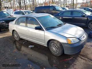 2002 Honda Civic LX with VIN 1HGES16542L034745, listed as a IAAI auction lot 41214825 with 260,792 mi miles. Bid and sale history available at carsss.com. Image 1.