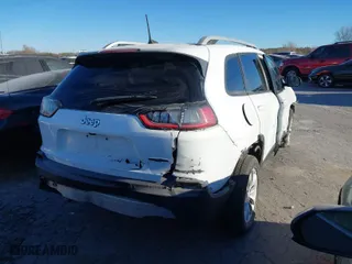 2020 Jeep Cherokee Latitude with VIN 1C4PJLCB2LD601353, listed as a IAAI auction lot 40908725 with 86,485 mi miles. Bid and sale history available at carsss.com. Image 4.