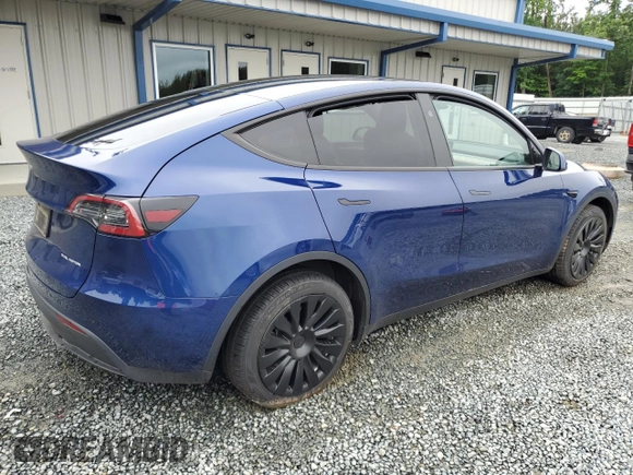 2024 Tesla Model Y Long Range with VIN 7SAYGDEE2RA246685, listed as a Copart auction lot 58699895 with 15,803 mi miles and Salvage title. Bid and sale history available at DreamBid. Image 3.