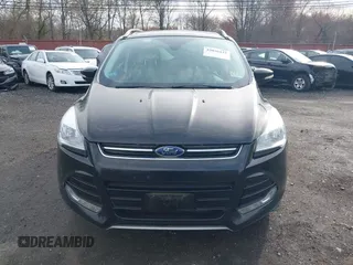 2014 Ford Escape Titanium with VIN 1FMCU9J98EUD73818, listed as a IAAI auction lot 42036442 with 129,794 mi miles. Bid and sale history available at carsss.com. Image 12.