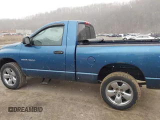 2005 Dodge 1500 SLT with VIN 1D7HU16NX5J626114, listed as a IAAI auction lot 41525885 with 121,885 mi miles and . Bid and sale history available at DreamBid. Image 14.