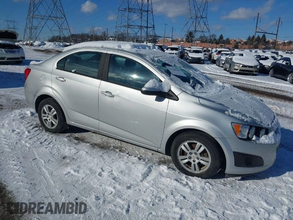 2012 Chevrolet Sonic LS z VIN 1G1JA5SH3C4149011, wystawiony jako IAAI lot #41380769 z przebiegiem 167 843 mil mil oraz . Historia ofert i sprzedaży dostępna na DreamBid. Obrazek 1.