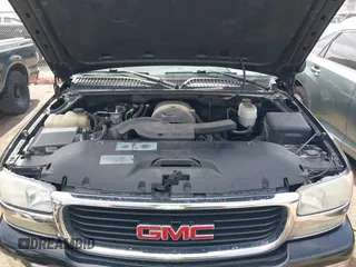 2005 GMC Yukon SLT with VIN 1GKEK13TX5R274020, listed as a IAAI auction lot 41889445 with 209,132 mi miles. Bid and sale history available at carsss.com. Image 10.