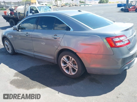 2013 Ford Taurus SEL with VIN 1FAHP2E89DG207904, listed as a IAAI auction lot 42184669 with 147,321 mi miles and . Bid and sale history available at carsss.com. Image 3.