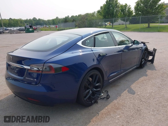 2017 Tesla Model S 100D with VIN 5YJSA1E27HF192505, listed as a IAAI auction lot 42409365 with 111,881 mi miles and . Bid and sale history available at DreamBid. Image 4.