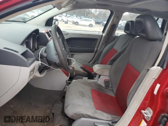 2007 Dodge Caliber SXT with VIN 1B3HB48B17D504667, listed as a Copart auction lot 43218045 with 213,195 mi miles and Clean Title. Bid and sale history available at DreamBid. Image 7.