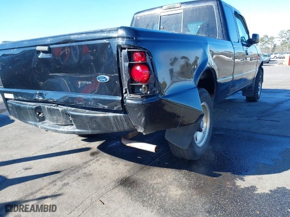 1999 Ford Ranger XL with VIN 1FTYR14X6XTA83979, listed as a IAAI auction lot 41355593 with 201,284 mi miles. Bid and sale history available at carsss.com. Image 6.