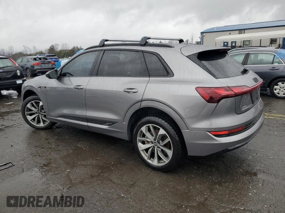 2021 Audi e-tron Premium Plus with VIN WA1LAAGEXMB017927, listed as a Copart auction lot 83877554 with 54,348 mi miles and Salvage Title. Bid and sale history available at DreamBid. Image 2.