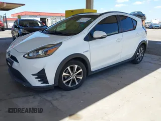 2018 Toyota Prius One with VIN JTDKDTB32J1600004, listed as a IAAI auction lot 42030186 with 61,568 mi miles and . Bid and sale history available at DreamBid. Image 16.
