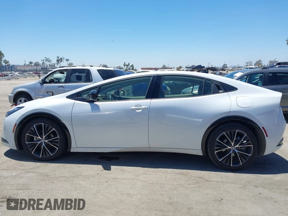 2024 Toyota Prius LE with VIN JTDACAAU2R3020703, listed as a IAAI auction lot 42644240 with 32,715 mi miles and . Bid and sale history available at DreamBid. Image 14.