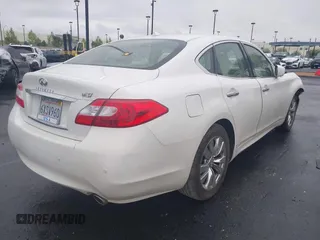 2013 Infiniti M with VIN JN1BY1AP2DM510953, listed as a IAAI auction lot 42157597 with 71,175 mi miles and . Bid and sale history available at DreamBid. Image 4.