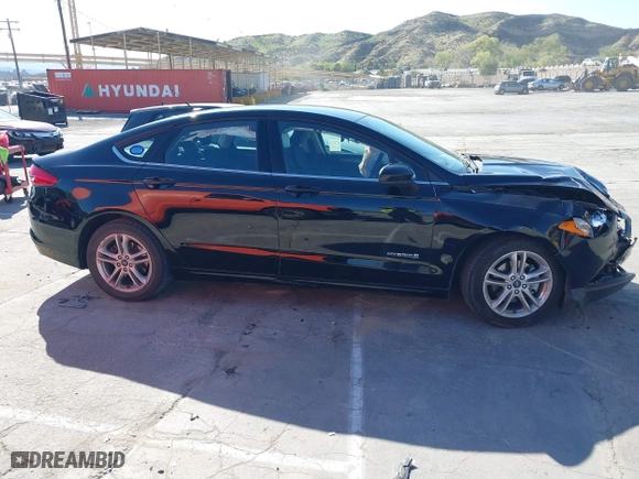 2018 Ford Fusion Hybrid SE with VIN 3FA6P0LU5JR257120, listed as a IAAI auction lot 41859050 with 142,524 mi miles. Bid and sale history available at carsss.com. Image 13.