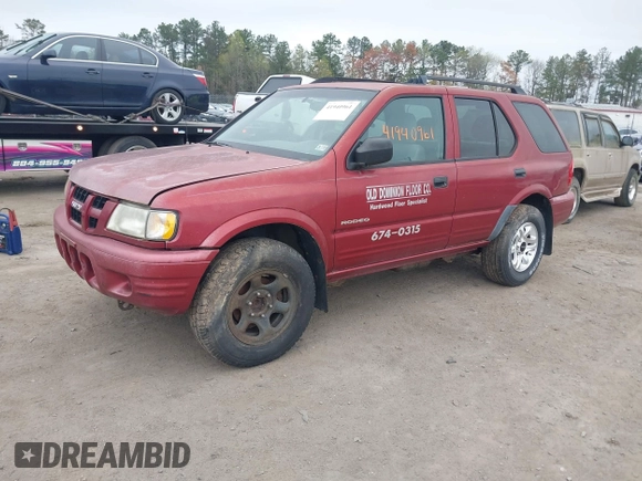 2004 Isuzu Rodeo S z VIN 4S2CK58W644317345, wystawiony jako IAAI lot #41940961 z przebiegiem Nie podano mil oraz . Historia ofert i sprzedaży dostępna na DreamBid. Obrazek 2.