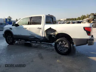 2023 Nissan Titan XD PRO-4X with VIN 1N6AA1FB1PN109108, listed as a Copart auction lot 71021034 with 15,828 mi miles and Salvage Title. Bid and sale history available at carsss.com. Image 2.