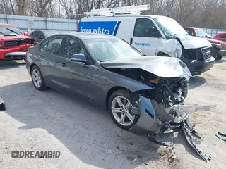 2014 BMW 3 Series 328i xDrive with VIN WBA3B3G5XENR83156, listed as a IAAI auction lot 41803982 with 111,318 mi miles. Bid and sale history available at carsss.com. Image 1.