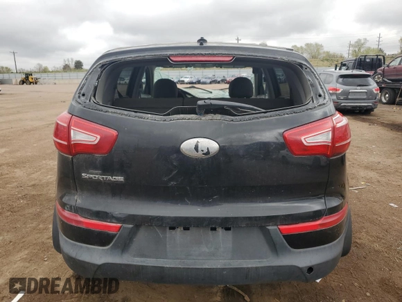 2013 Kia Sportage LX z VIN KNDPBCA25D7450010, wystawiony jako Copart lot #54597815 z przebiegiem 110 980 mil mil oraz Czysty tytuł • Clean title. Historia ofert i sprzedaży dostępna na DreamBid. Obrazek 6.