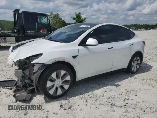 2023 Tesla Model Y Long Range z VIN 7SAYGDEE6PF947228, wystawiony jako Copart lot #55203665 z przebiegiem 20 661 mil mil oraz Szkoda całkowita • Salvage title. Historia ofert i sprzedaży dostępna na DreamBid. Obrazek 1.