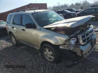 2010 Ford Escape XLT с VIN 1FMCU0D71AKA71198, выставлен на аукционе Copart как лот 48766805 с пробегом 243 732 миль миль и Списание • Salvage title. История ставок и продаж доступна на DreamBid. Изображение 4.