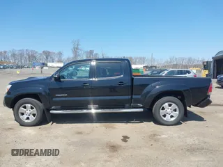2015 Toyota Tacoma with VIN 3TMMU4FN7FM085666, listed as a IAAI auction lot 42051241 with 224,513 mi miles and . Bid and sale history available at DreamBid. Image 14.