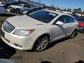 2012 Buick LaCrosse Premium 1 with VIN 1G4GE5E3XCF287344, listed as a Copart auction lot 77935804 with 129,843 mi miles and Salvage title. Bid and sale history available at DreamBid. Image 1.