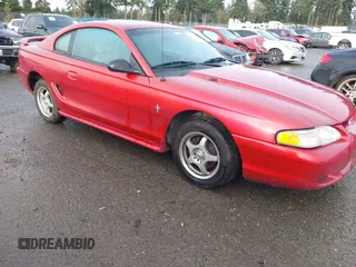 1996 Ford Mustang with VIN 1FALP4042TF223781, listed as a IAAI auction lot 41197025 with 116,106 mi miles. Bid and sale history available at carsss.com. Image 1.