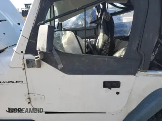 1998 Jeep Wrangler SE with VIN 1J4FY29P0WP707480, listed as a Copart auction lot 88546815 with 0 mi miles and Salvage Title. Bid and sale history available at carsss.com. Image 7.