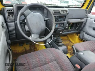 2000 Jeep Wrangler Sport with VIN 1J4FA49SXYP789791, listed as a Copart auction lot 60538875 with Not provided miles and Salvage title. Bid and sale history available at DreamBid. Image 8.