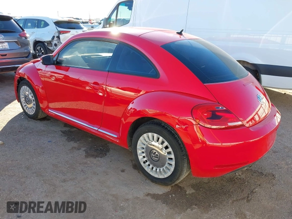 2013 Volkswagen Beetle with VIN 3VWHX7AT3DM682758, listed as a IAAI auction lot 40869170 with 88,793 mi miles and . Bid and sale history available at DreamBid. Image 3.