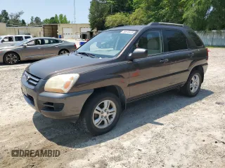 2006 Kia Sportage LX with VIN KNDJF723367140160, listed as a Copart auction lot 59518415 with 214,197 mi miles and Salvage title. Bid and sale history available at DreamBid. Image 1.