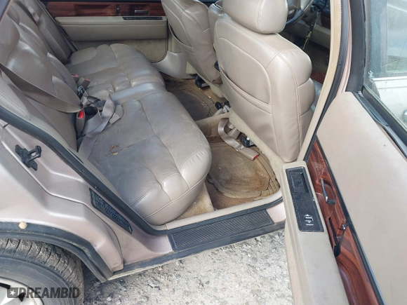 1998 Buick LeSabre Limited with VIN 1G4HR52K3WH511664, listed as a IAAI auction lot 41955496 with 175,913 mi miles. Bid and sale history available at carsss.com. Image 8.