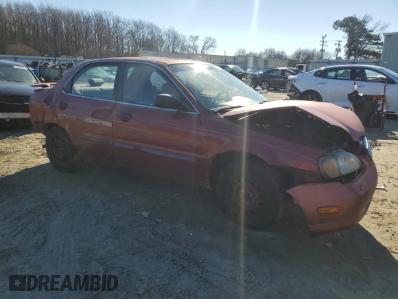 2001 Suzuki Esteem GL z VIN JS2GB41S915202412, wystawiony jako Copart lot #88372235 z przebiegiem 301 061 mil mil oraz Szkoda całkowita • Salvage title. Historia ofert i sprzedaży dostępna na DreamBid. Obrazek 4.