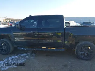 2015 Chevrolet Silverado 1500 LT with VIN 3GCUKREC8FG309500, listed as a IAAI auction lot 41568103 with 174,211 mi miles and . Bid and sale history available at DreamBid. Image 14.