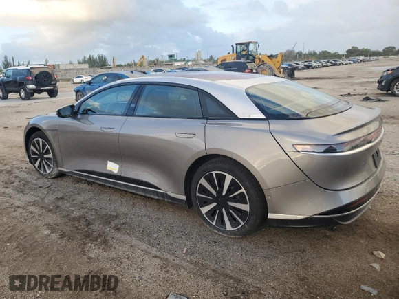 2023 Lucid Air Touring z VIN 50EA1TEA5PA004467, wystawiony jako Copart lot #76620154 z przebiegiem 6 108 mil mil oraz Szkoda całkowita • Salvage title. Historia ofert i sprzedaży dostępna na DreamBid. Obrazek 2.