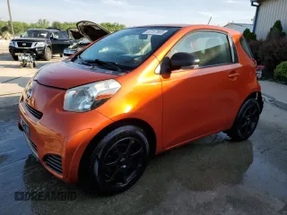 2012 Scion iQ with VIN JTNJJXB0XCJ020404, listed as a Copart auction lot 62157565 with 82,869 mi miles and Non repairable. Bid and sale history available at DreamBid. Image 1.