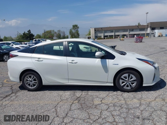 2016 Toyota Prius Four with VIN JTDKARFUXG3511034, listed as a IAAI auction lot 42137394 with 77,424 mi miles. Bid and sale history available at carsss.com. Image 13.