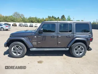 2018 Jeep Wrangler Unlimited Sahara with VIN 1C4HJXEG0JW166645, listed as a IAAI auction lot 42228492 with 58,416 mi miles and . Bid and sale history available at DreamBid. Image 15.