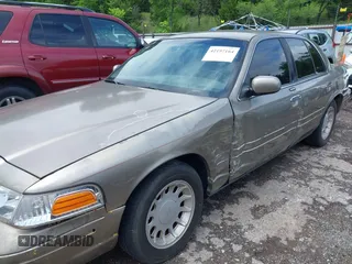 2002 Ford Crown Victoria LX z VIN 2FAFP74W52X112493, wystawiony jako IAAI lot #42197164 z przebiegiem 103 941 mil mil oraz . Historia ofert i sprzedaży dostępna na DreamBid. Obrazek 6.