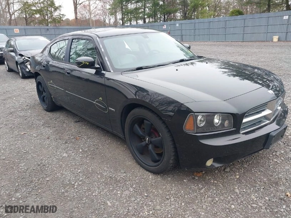 2006 Dodge Charger R/T with VIN 2B3KA53H66H195855, listed as a IAAI auction lot 42010206 with 121,889 mi miles. Bid and sale history available at carsss.com. Image 1.