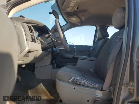 2005 Dodge Durango SXT with VIN 1D4HD38K35F512020, listed as a Copart auction lot 74292234 with 164,075 mi miles and Salvage title. Bid and sale history available at DreamBid. Image 7.