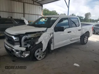 2023 Ford F-150 XL with VIN 1FTEW1C8XPKD33994, listed as a Copart auction lot 63326315 with 55,593 mi miles and Salvage title. Bid and sale history available at DreamBid. Image 1.