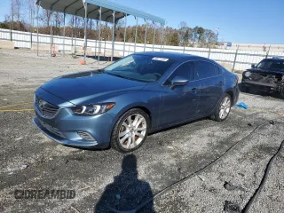 2014 Mazda Mazda6 i Touring with VIN JM1GJ1T55E1110567, listed as a Copart auction lot 83671234 with 143,824 mi miles and Salvage Title. Bid and sale history available at carsss.com. Image 1.
